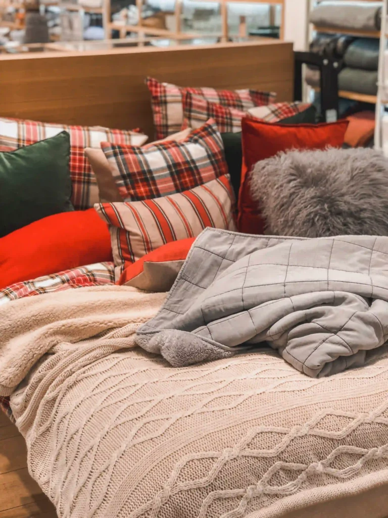 cozy corner for fall with pillows and rugs